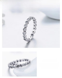 Macro detail of S925 sterling silver eternity ring featuring round-cut pavé zircons