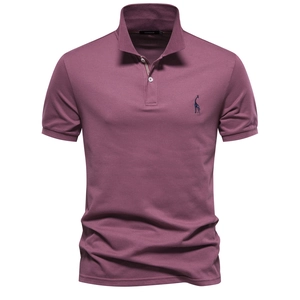 Detail of premium cotton purple Polo shirt featuring refined giraffe chest embroidery