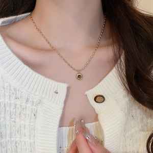 Vintage golden necklace with faux tiger eye round pendant on a rice chain for women