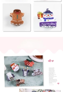 Macro detail of Christmas hair clips featuring gingerbread man and snowman designs