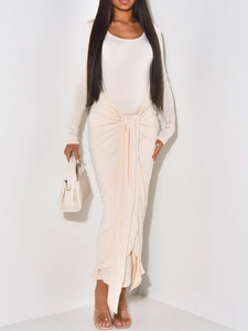 Elegant beige long sleeve maxi dress with front knot tie and draped waist detail