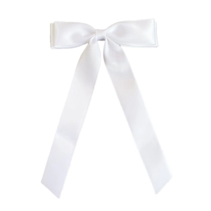 Close-up of double-layered white satin ribbon hair clip with elegant long streamers