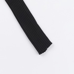 Close-up macro detail showing the black ribbed knit texture and fabric of the sleeve