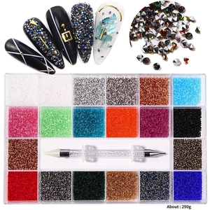 Professional 24-grid nail art rhinestone set with multi-colored gems and dotting pen tool