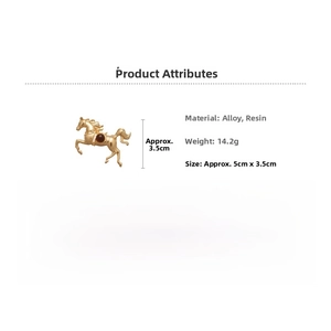 Detail view of a vintage gold horse brooch with brown resin inlay showing size 5cm x 3.5cm