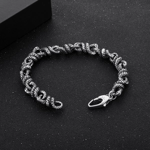 Bracciale punk in acciaio inossidabile a doppia vipera con trama a scaglie dettagliata