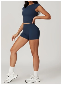 Close-up of high-waist yoga shorts in navy blue with professional compression fabric