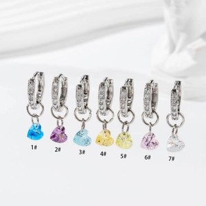 Silver hoop earrings with colorful zircon heart pendants available in seven different colors