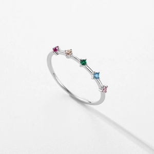 Minimalist S925 silver ring featuring five colorful round-cut zircon gemstones
