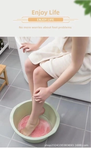Pink silicone foot massage mat with suction cups shown in use for shower spa and cleaning