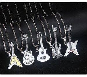 Collection of minimalist guitar pendants in polished silver and gold stainless steel