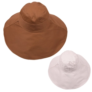 Detailed view of wide brim sun hats in dark brown and beige cotton fabric for women
