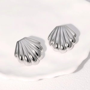 Polished silver shell earrings made of stainless steel with a minimalist sea design