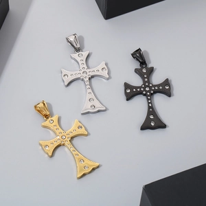 Hip hop fleur-de-lis cross pendants in gold, silver, and black with sparkling rhinestones