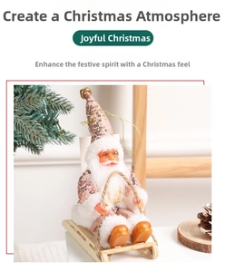 Pink sequined Santa Claus doll sitting on a rustic wooden sleigh Christmas decoration