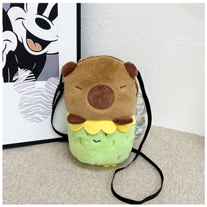 Detail of Capybara plush crossbody bag featuring colorful patchwork and adjustable strap