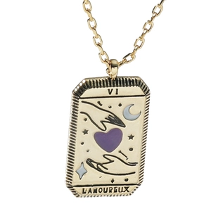 Gold tarot card pendant necklace featuring the Lovers VI design and purple heart detail