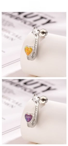 Detailed view of U-shaped heart earrings featuring opal texture and clear cubic zirconia