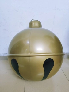 Detailed view of a 60cm giant golden inflatable Christmas bell decoration with black patterns