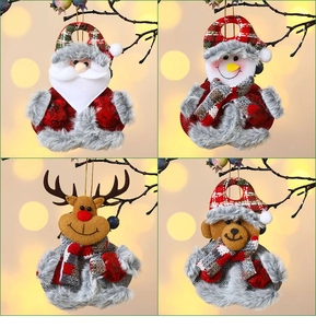 Detail of four Christmas plush ornaments featuring Santa, snowman, reindeer and bear