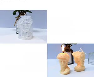Macro detail of Michelangelo David silicone candle mold and the beige wax sculpture