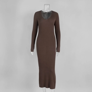 Detail of ribbed knit texture on a long sleeve V-neck brown slim fit maxi dress