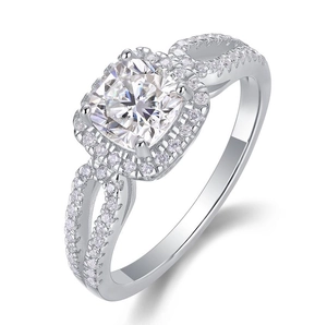 Detail of cushion-cut moissanite ring with halo setting and split shank in 925 silver