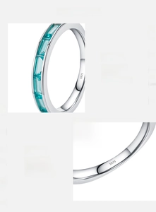 Detailed view of hand-set 5A blue zircon and S925 sterling silver stamp on the ring