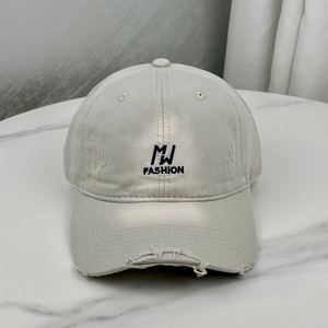 Distressed cream baseball cap with MW FASHION embroidery and wide brim for sun protection