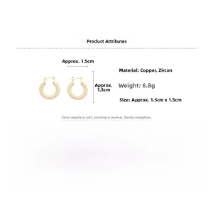 Detail of gold plated U-shaped cubic zirconia earrings with 1.5cm size and 6.8g weight
