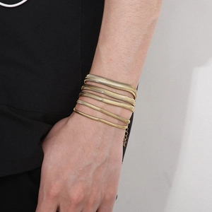 Set of 5 minimalist gold-plated stainless steel flat snake bracelets for layered fashion