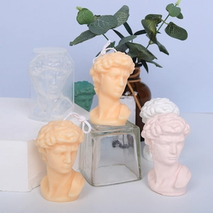 DIY David bust silicone mold with finished aromatic wax candles in various colors