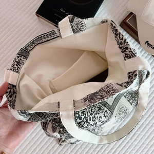 Top view of spacious floral canvas tote interior with inner pocket and boho print