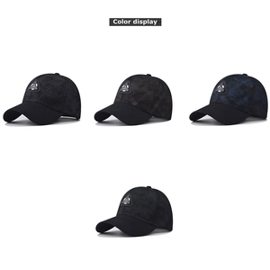 Classic embroidered baseball caps in black, grey, and navy with textured patchwork design