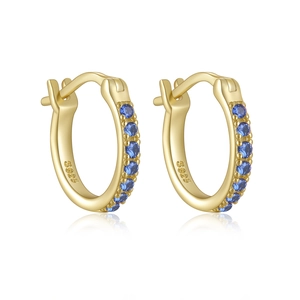 Close-up of S925 sterling silver gold plated hoop earrings with blue zircon stones
