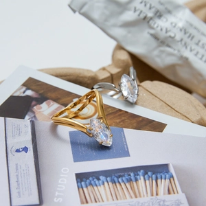 Minimalist V-shaped stainless steel rings with marquise cut zircon in gold and silver