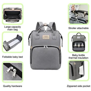 Multifunctional grey diaper bag with foldable crib, thermal pockets and stroller hooks