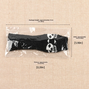 Size measurements showing 31cm length and 15cm width for the skull knitted arm warmers