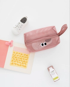 Pink mesh bag with large eye embroidery and zipper handle for travel and storage