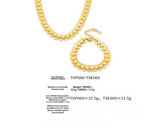 Detail view of 18k gold plated chunky chain necklace and bracelet with dimensions