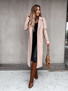 Detail of beige long wool coat with V-neck and waist tie design on street fashion model