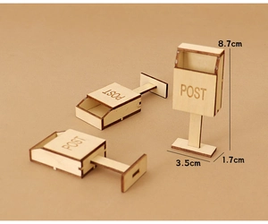 Detailed view of miniature wooden dollhouse post boxes with engraved POST lettering