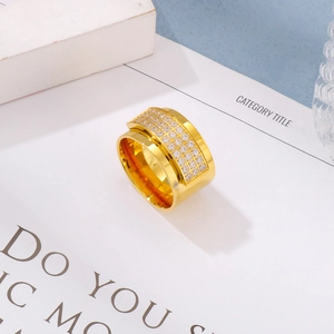 Polished 18k gold plated spinner ring with three rows of sparkling pavé crystals