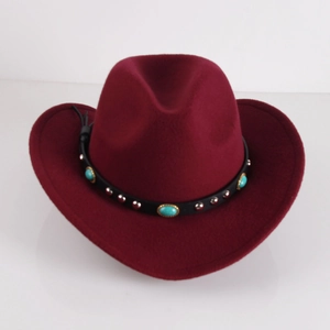 Detail of burgundy wool fedora with turquoise stones and silver rivets on a black band