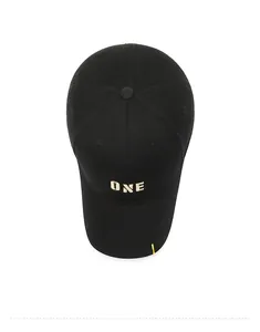 Top view of black cotton baseball cap featuring gold ONE embroidery and colorful side tape