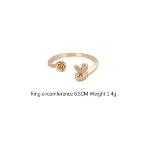 Anello regolabile in oro con ape e rosa e zirconi, circonferenza 6.5cm, peso 1.4g
