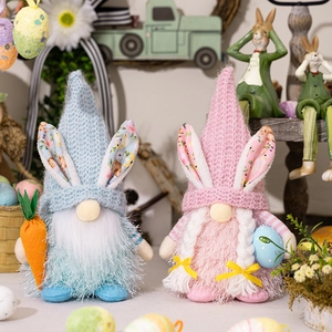 Easter Gnomes plush dolls with bunny ears holding carrot and egg in festive setting