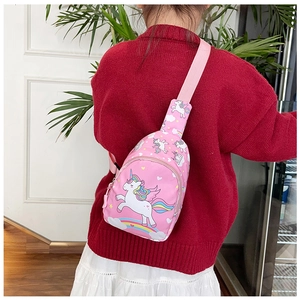 Pink unicorn kids chest bag shown on model with adjustable strap and rainbow patterns