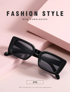 Close-up of model 2176 black square sunglasses on a pink geometric background