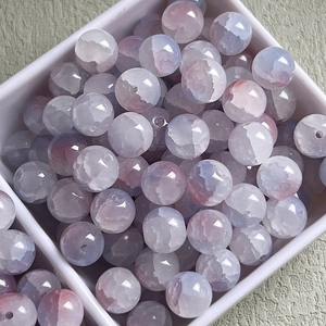 Detail of 10mm faceted glass beads in gradient pink and purple for DIY jewelry making
